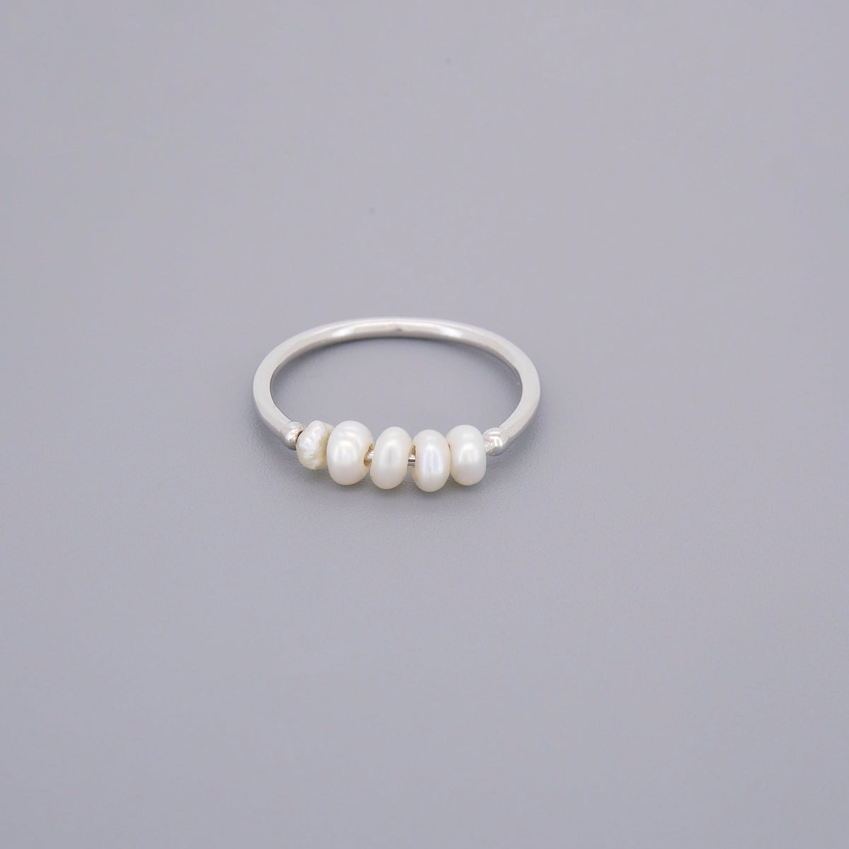 Half Eternity Pearl Rings